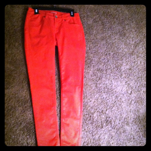 Neon orange skinny jeans