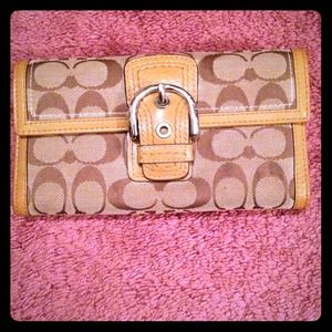 SOLD Authentic, lightly loved, large coach wallet