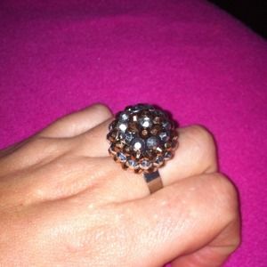 Shiny brown ball ring