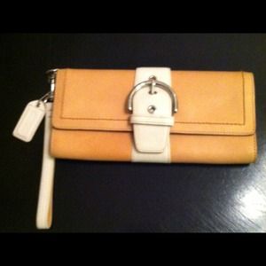 Coach Clutches & Wallets - White and tan Coach clutch with wrist strap. Coach Clutches & Wallets - White and tan Coach clutch with wrist strap.