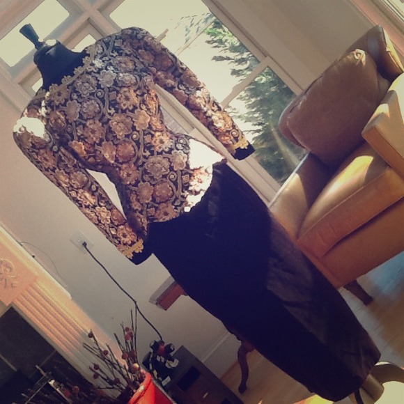 Elegant evening gown with a back drop v cut