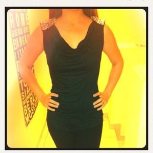 Express top with rhinestones