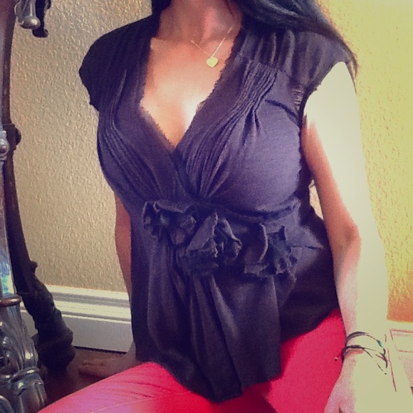 SOLD........Anthropologie pretty black rosette top