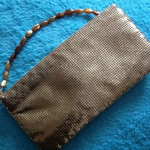 4. Guess vintage gold handbag