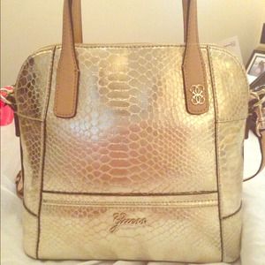 Guess gold metallic hand bag