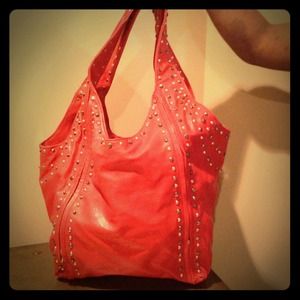 Red purse with flat studds