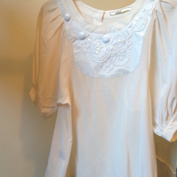 White silk blouse with embelishments