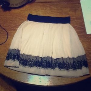 Small Charlotte Russe pink skirt with black lace