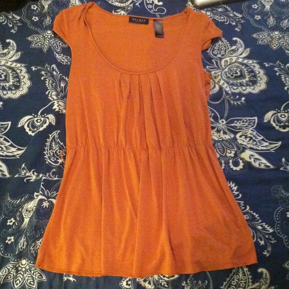 Dark orange top