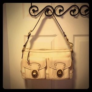Coach white leather handbag with brass buckles