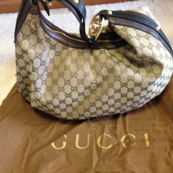 Gucci Handbags - Authentic Gucci black & brown hobo