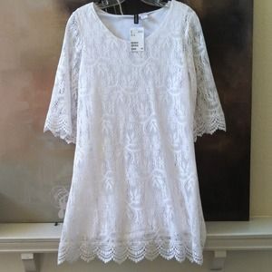 ⭐Reserved⭐. White lace dress size 12 from H&M.NWT.