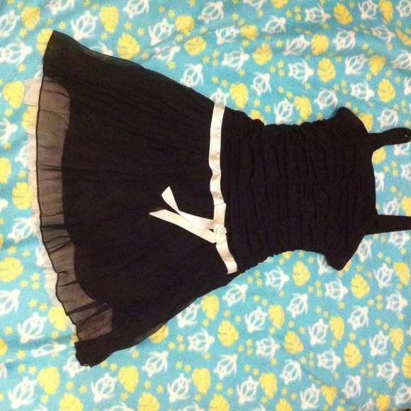 Black Dress. White Belt with little jewel