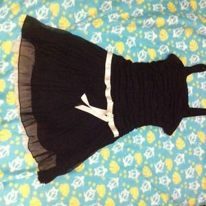 Black Dress. White Belt with little jewel