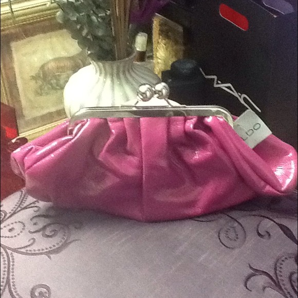 ALDO fuschia patten leather clutch