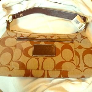 Coach purse M sized handbag/purse brown colored