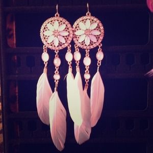 feather earrings.