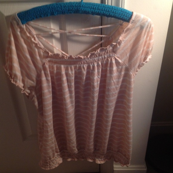 Peasant style stopped top that's light pink.