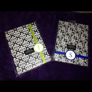 Journal with monogram "J" and "S".