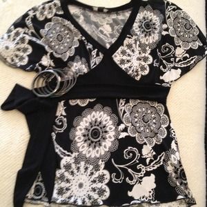 Black and white polyester top. Size small.