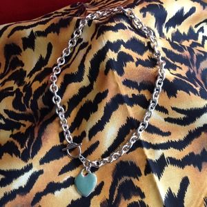 Silver tone heart shaped necklace