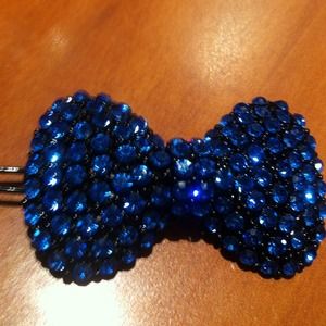 A beautiful swarovski hair clip shaped like a bow