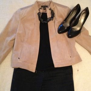 100% leather khaki colored jacket. Size medium.