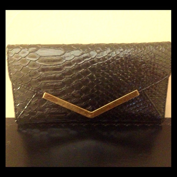 Black snakeskin clutch.