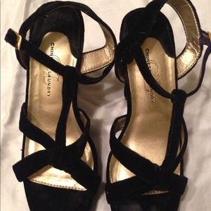 Size 7 almost new black velvet CL platform heels.