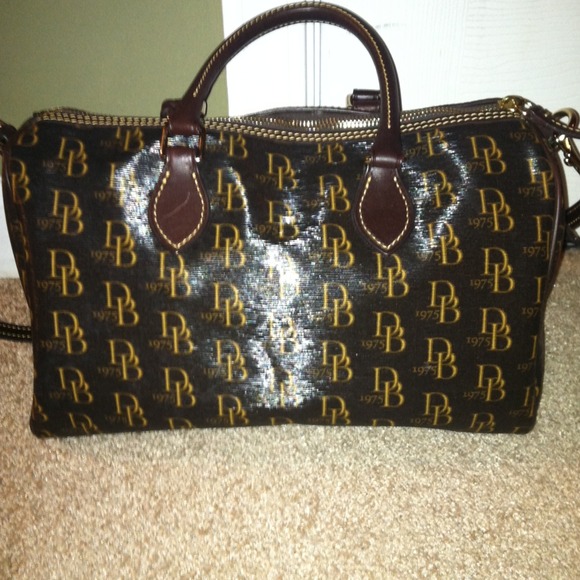 ***Reserved****Dooney and Bourke barrel handbag