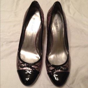 Never worn Nine West pumps.  Size 6 1/2