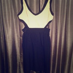 Super cute cut out ivory an black dress