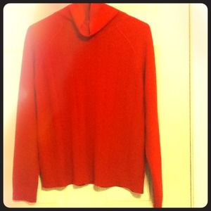 Red knitted turtle neck sweater