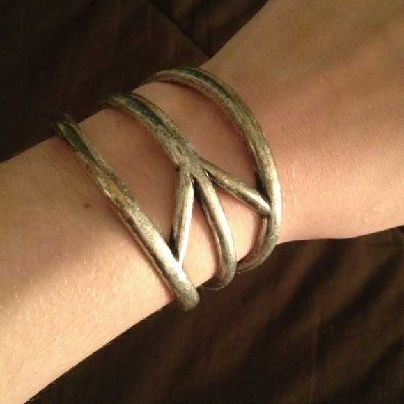 Lucky Brand Jeans "Peace" cuff.