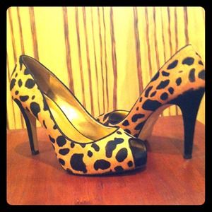 Authentic Guess leopard print peep toe stilettos