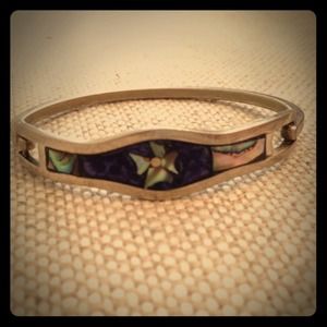 Small silver bracelet with handmade designs