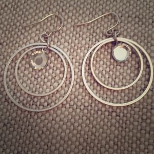 Circle earrings with jeweled center