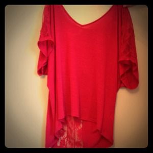 Hot pink high low style shirt with lace detailing