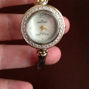 Two toned Anne Klein bangle watch.