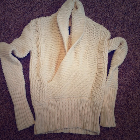 Large neck sweater.