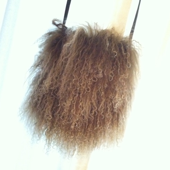 Fun animal fur over the shoulder purse.