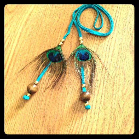 SOLD!!SOLD!!Leather n peacock feather wrap