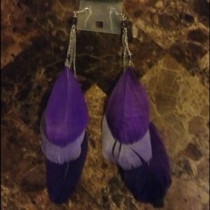 Purple feathered earrings