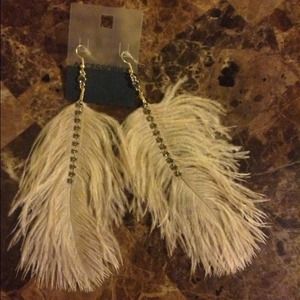 Cream feathered earrings