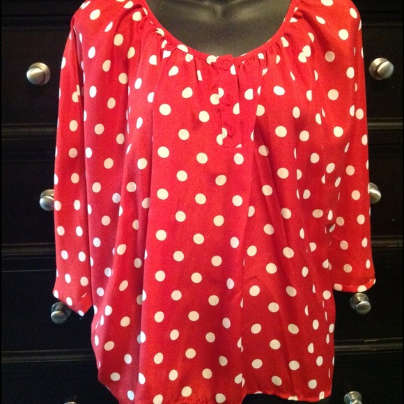 Red and white polka dot bat wing top