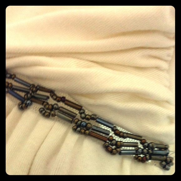 Metro 7 beaded flowy cream color tank top.