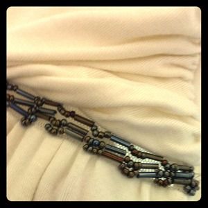 Metro 7 beaded flowy cream color tank top.