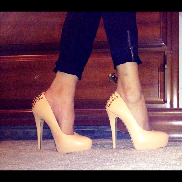 Nude spiked heels