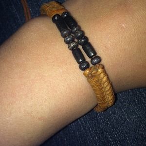 Pull string bracelet