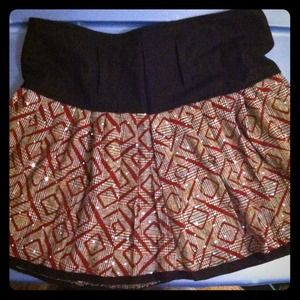 Sparkly short skirt with belt loops